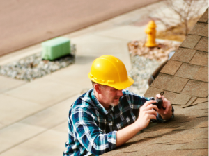 Detailed inspection by a professional roofer in Chesterfield, assessing a home's roof for repair or replacement.