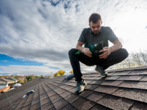 Gateway Brothers Construction expert performing a detailed roof inspection for Eureka Roofing Services