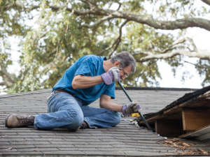 Do-It-Yourself Roofer Utilizing Roofing Tools Suggested by High Ridge