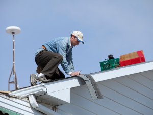 DIY Roofer Using High Ridge Recommended Roofing Tools